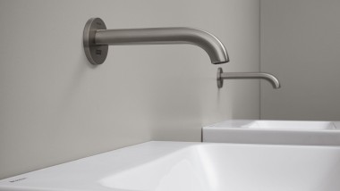 Geberit Piave wall-mounted washbasin tap in a round, brushed stainless steel design