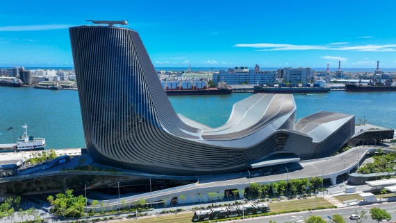 The port terminal nestles against the water like the hull of a ship